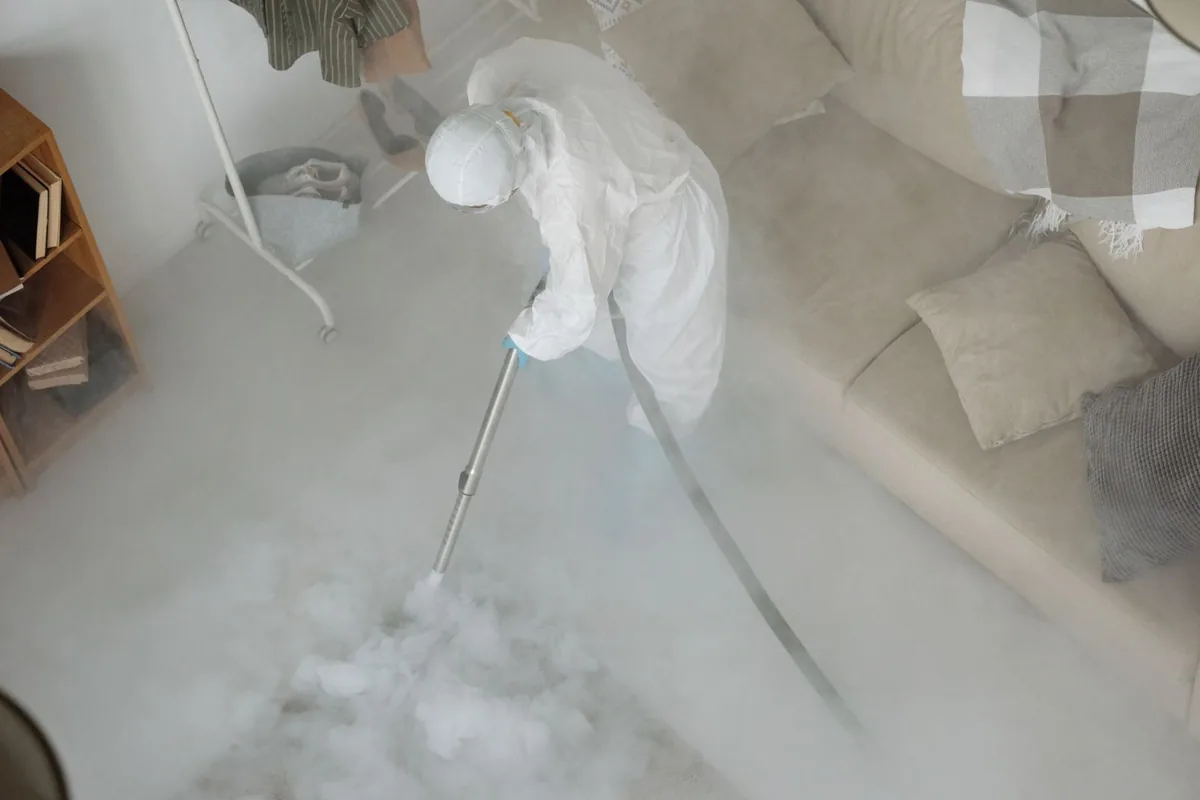 Biohazard cleanup technician in protective equipment, Hoboken, GA